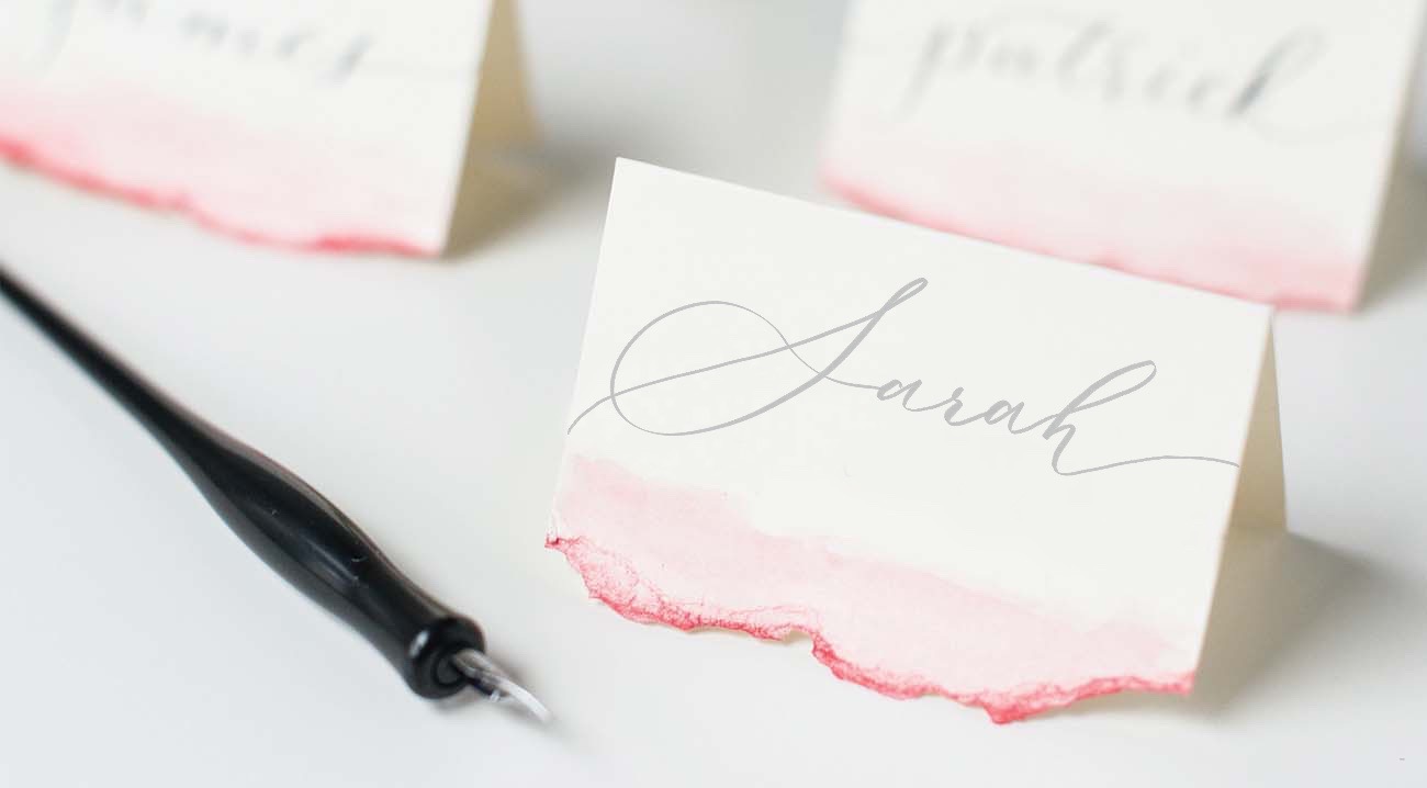 Pink watercolor place card deckled edge gray hand calligraphy